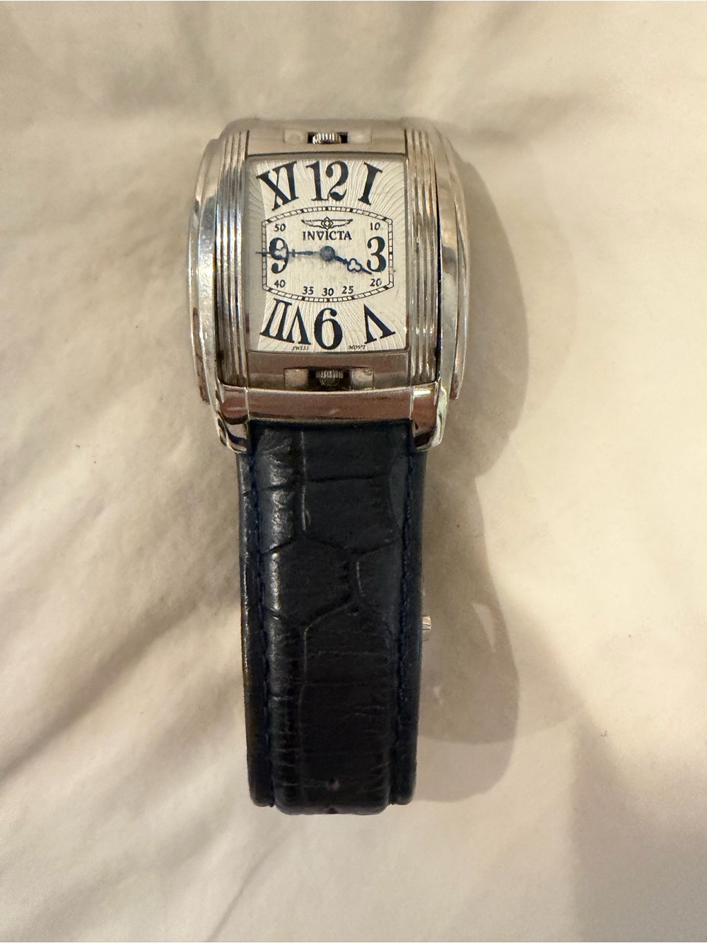 Invicta Men’s Silver Case Watch with Black Leather Strap Model 4224
